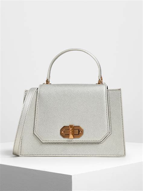 charles and keith silver handbags